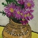 Fioletowe kwiaty w wazonie